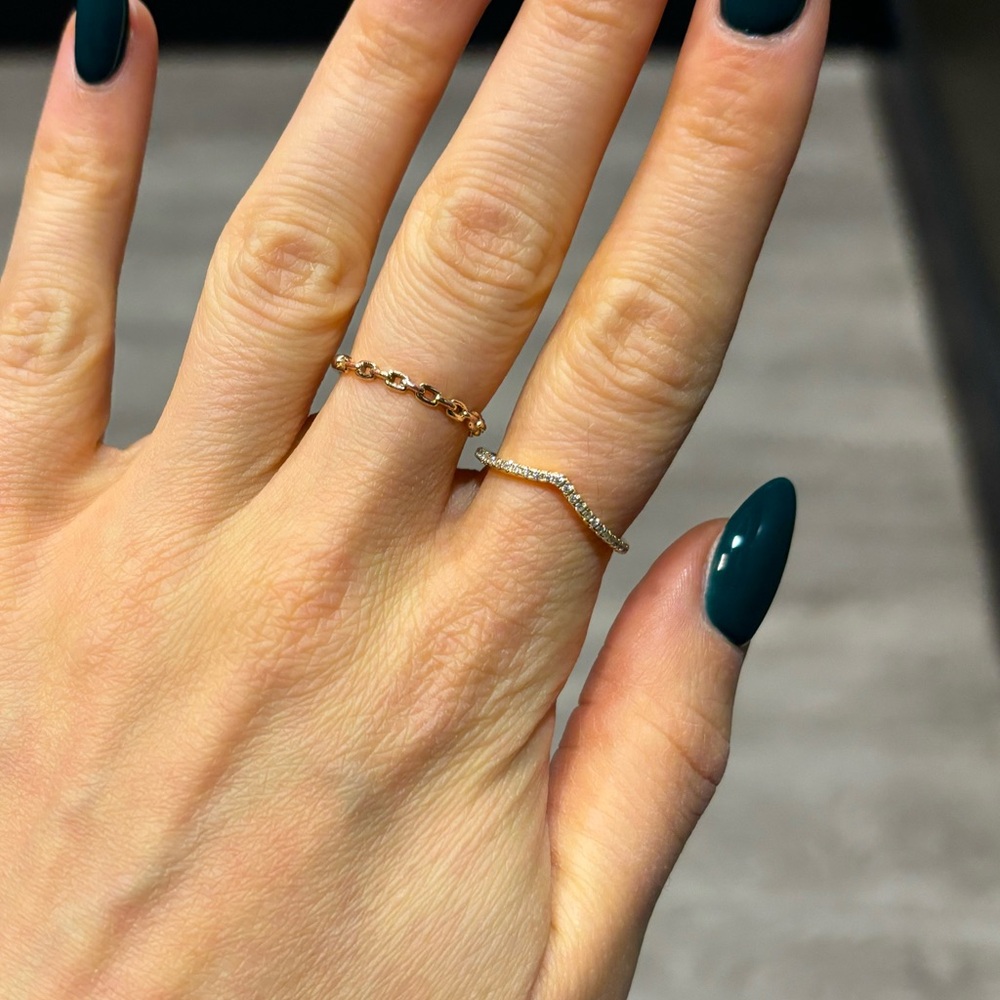 Delicate dainty gold ring in v shape with cz stones pave